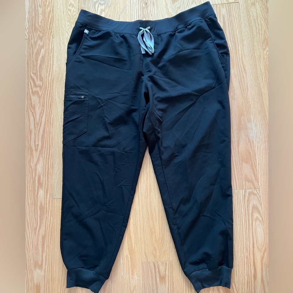 FIGS joggers with Aya Healthcare Logo